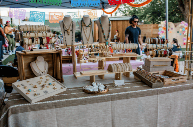 Jewelry vendor market table in the courtyard